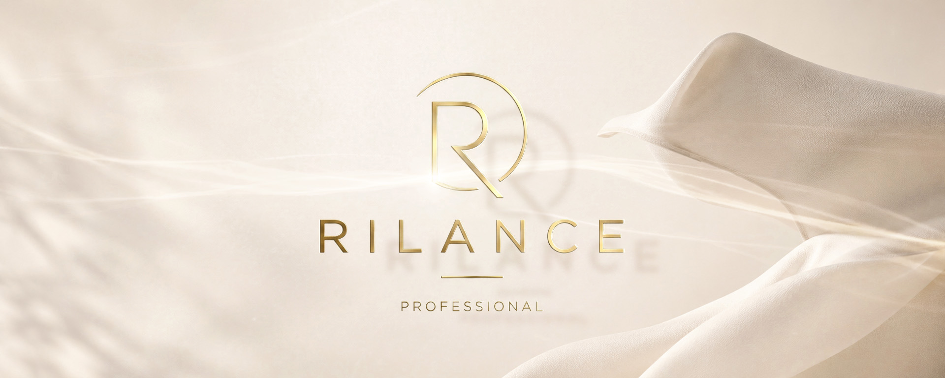 Rilance Professional – arany R monogram és felirat krémszínű selyem háttéren